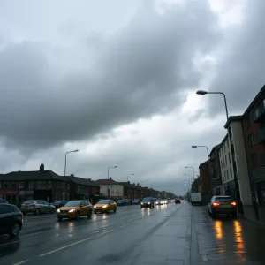 A rain-soaked Birmingham street during May with heavy clouds.