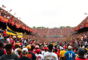 Crowd cheering at the Magic City Classic football game