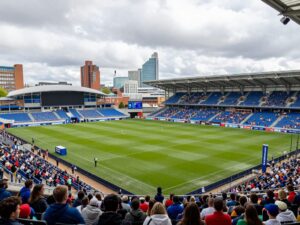 A dynamic view of Birmingham featuring various sporting events and enthusiastic spectators.