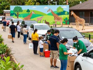 Families participating in the Household Drop-Off event at Birmingham Zoo