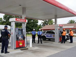 Police and emergency responders at a Birmingham gas station