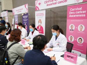 A community health event promoting cervical cancer awareness with UAB representatives.