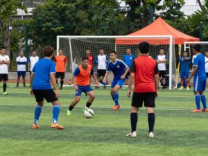 A football field symbolizing teamwork and community contribution